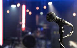 close-up-microphone-concert-stage-with-beautiful-lighting